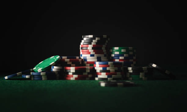Caribbean Stud Poker dealer at live casino table with four camera angles visible on mobile